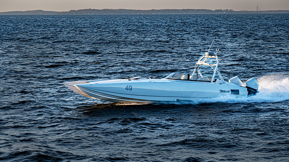 Scion 10 boat - Manta Ray motor craft boat on water