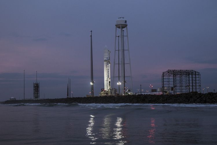 Rocket on launch pad at dawn