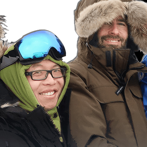 male and female wearing cold weather gear
