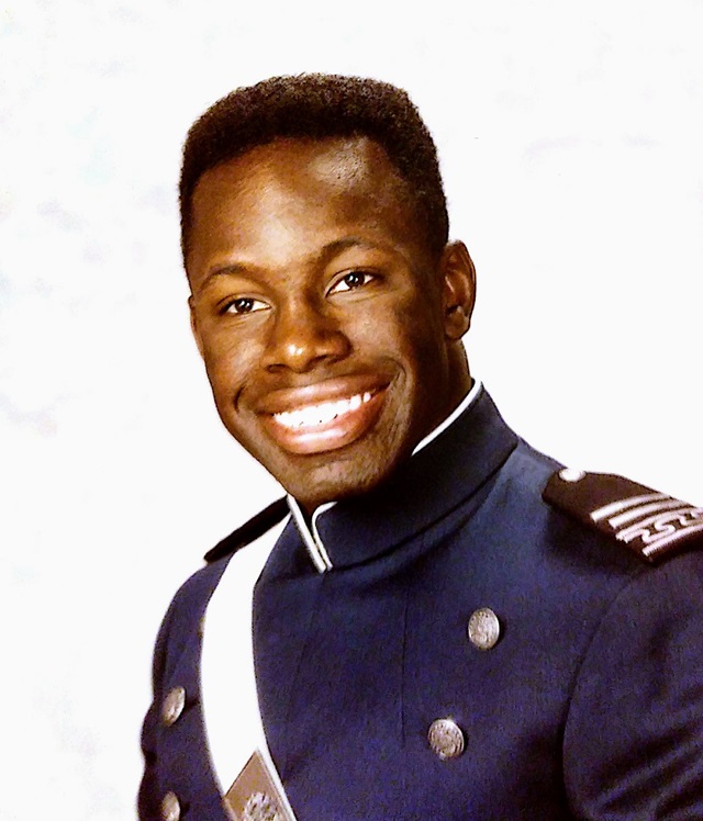 Young Black man smiles in Army uniform