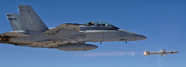aircraft firing an Advanced Anti-Radiation Guided Missile (AARGM) in the blue sky