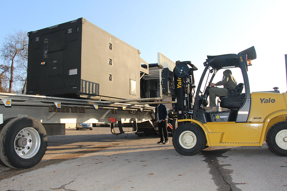 forking loading equipment on a truck