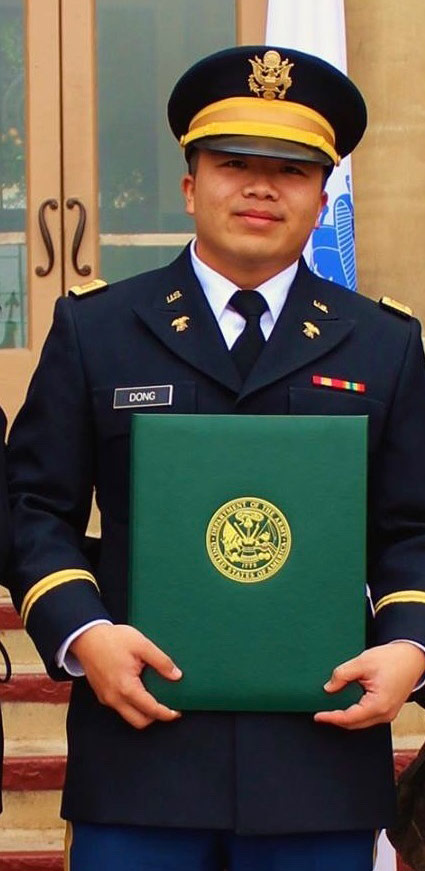 soldier in uniform holding diploma