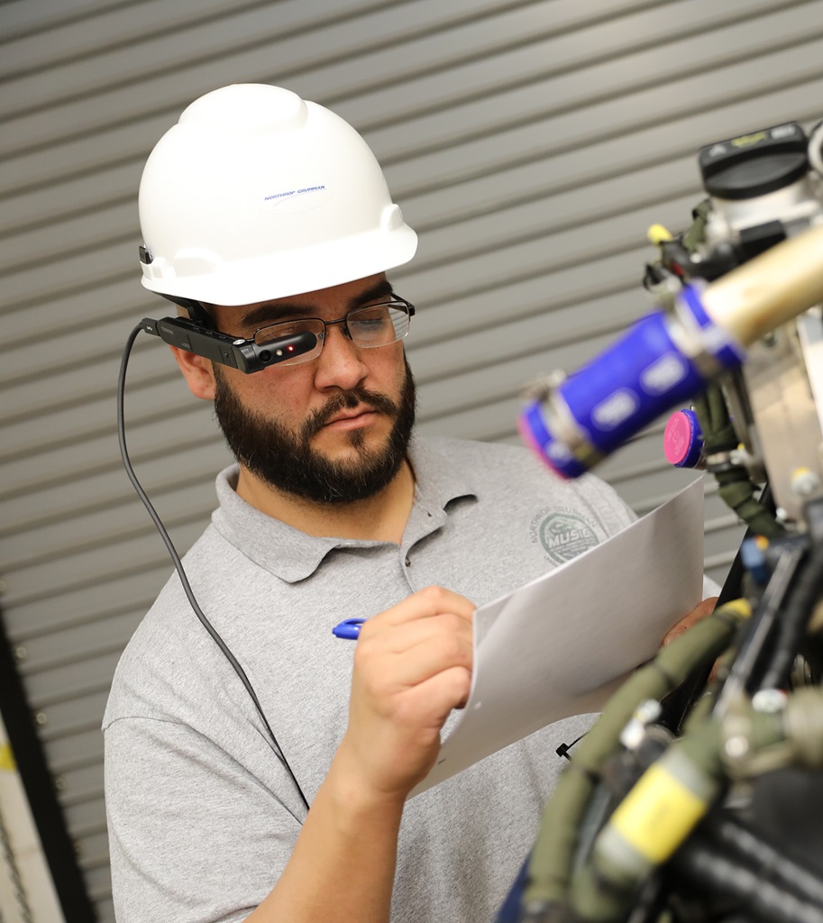 Advanced manufacturing Engineer wearing hard hat and electronic glasses