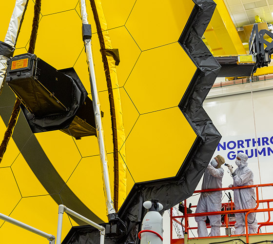 Webb Telescope being serviced by technians